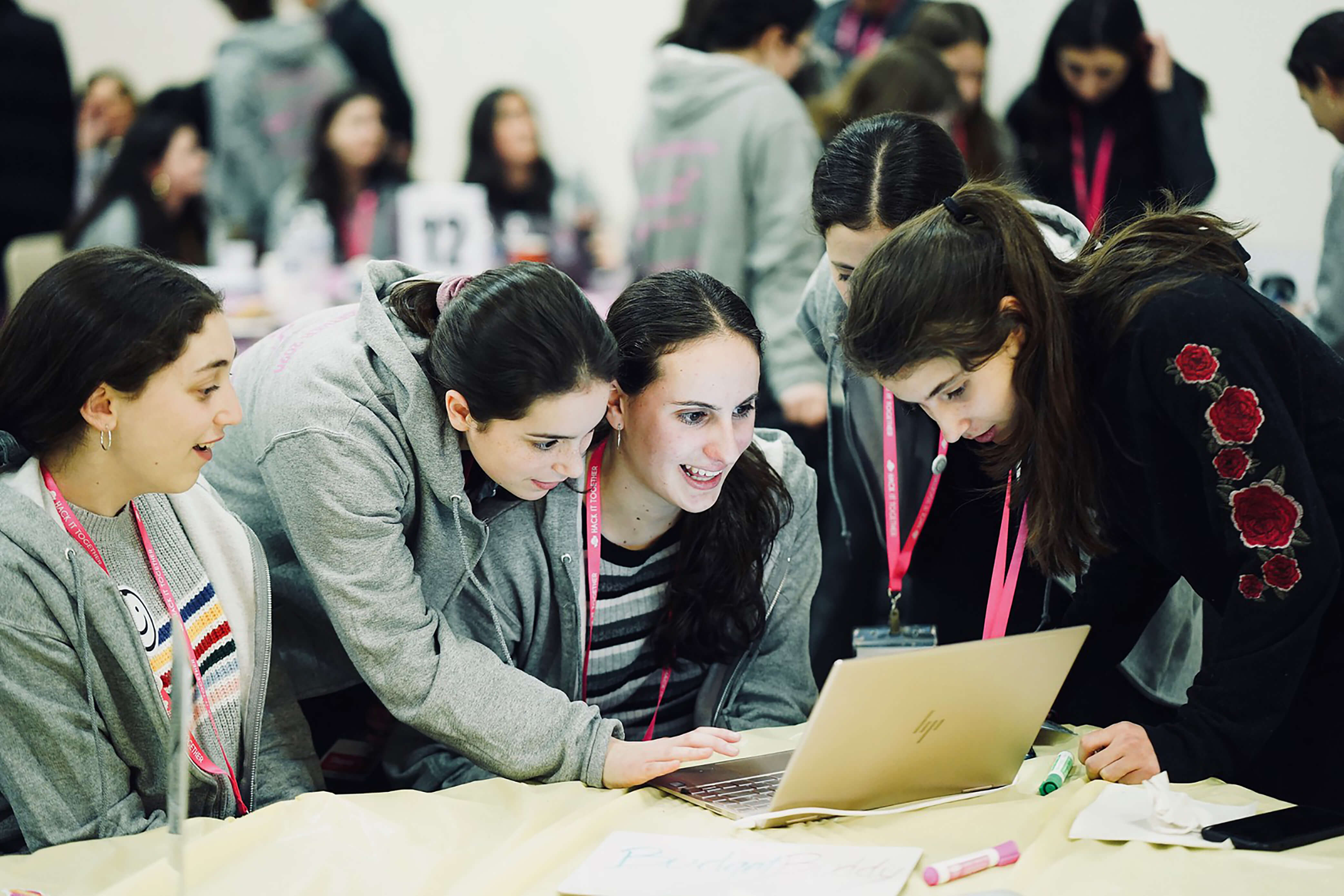 Hackers at LCW\'s 5th annual hackathon team up to plan their project