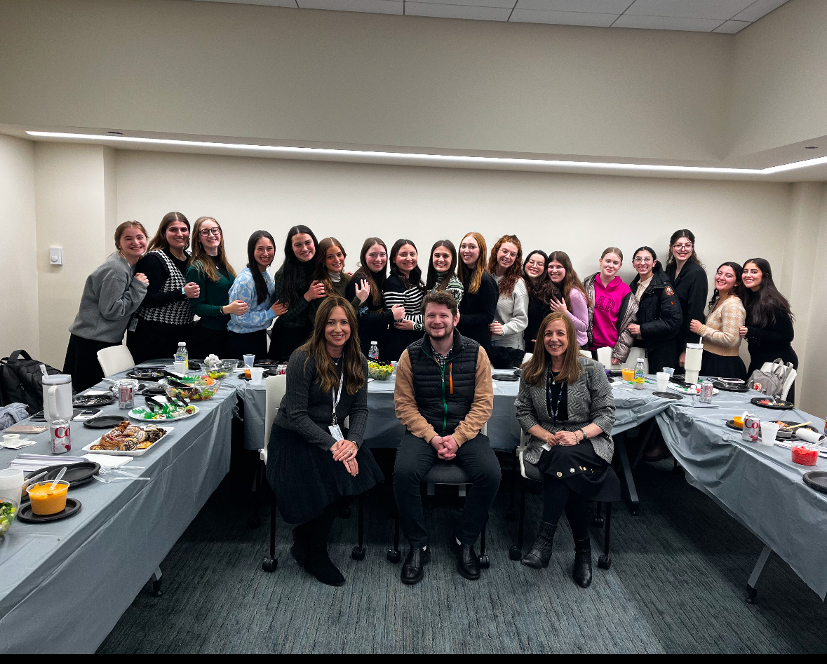 Shabbos Kestenbaum is pictured with Lander College for Women students and faculty.