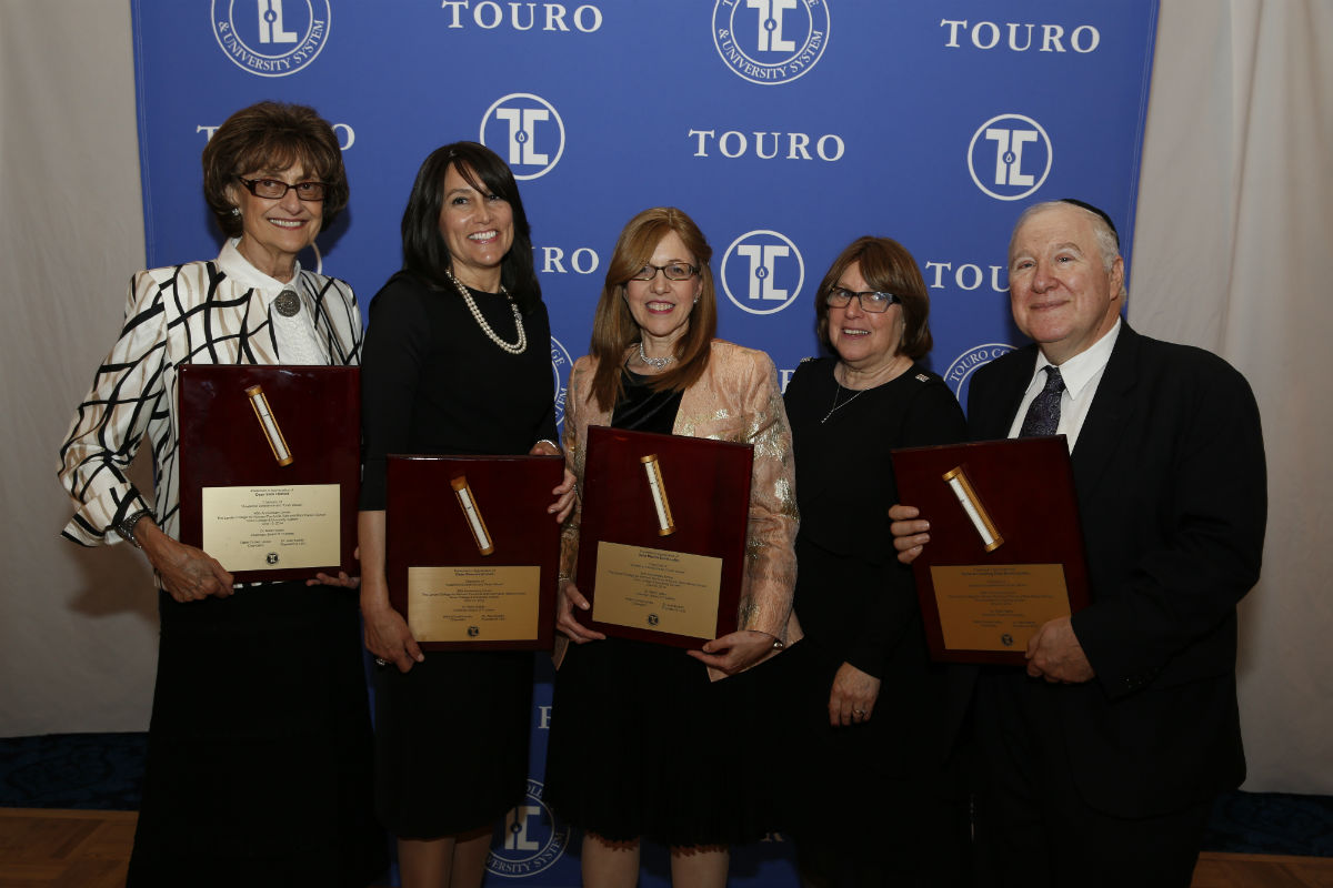 The five honorees at the Lander College for Women 40th Anniversary Dinner (l-r): former deans Dr. Sara E. Freifeld and Devorah Ehrlich; current dean Dr. Marian Stoltz-Loike; Vivian Luchins; and Founding Dean Dr. David Luchins.